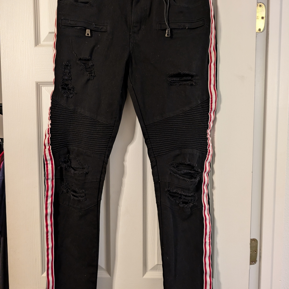 Stylish Black Distressed Pants with Red Stripes